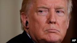 President Donald Trump listens as the Emir of Kuwait, Sheikh Sabah Al-Ahmad Al-Jaber Al-Sabah, speaks during a news conference in the East Room of the White House in Washington, Sept. 7, 2017.