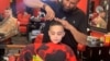 Books and Barbers: How a Haircut Is Helping Students Read