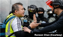 香港记者协会主席陈朗升在2019年“反送中”抗争中进行采访活动。（陈朗升授权使用）