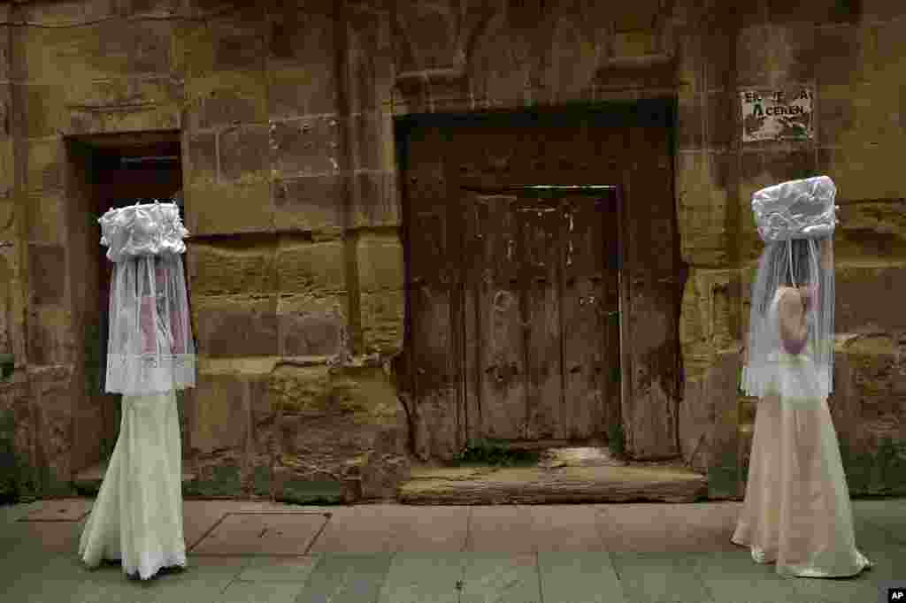 Participants of ''Bread Procession of the Saint'' take part in a ceremony to honor Domingo de La Calzada Saint (1019-1109), who helped poor people and pilgrims, in Santo Domingo de La Calzada, northern Spain.