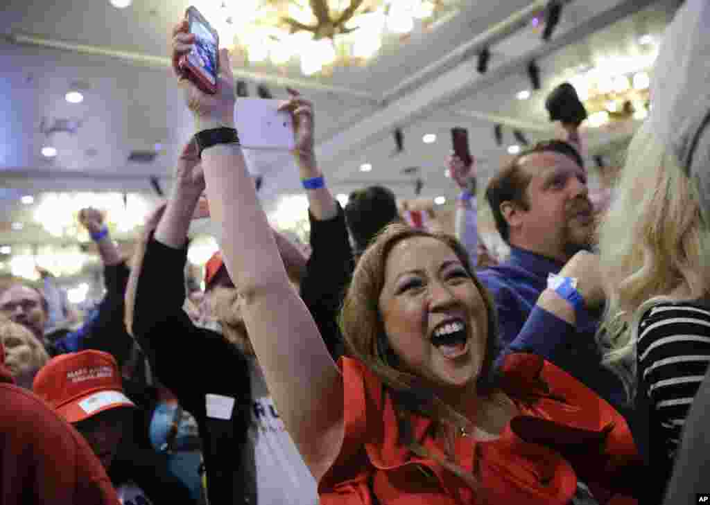 Supporters cheer during a caucus night rally for Republican presidential candidate Donald Trump, Feb. 23, 2016.
