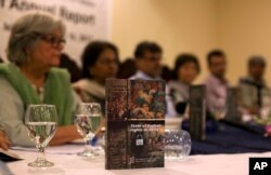 FILE - The Human Rights Commission of Pakistan presents the 2016 annual human rights report, in Islamabad, Pakistan, May 10, 2017. The report offered a mixed report card in its annual look at the state of human rights in Pakistan.