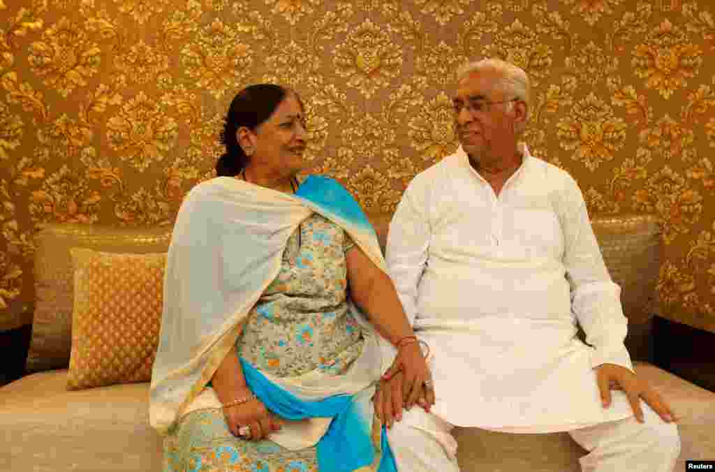 Asha Ahuja, 71, a housewife, poses for a portrait with her husband, Chandrabhan Ahuja, 73, a businessman inside their house in Mumbai, India, Feb. 7, 2018. Asha said: &quot;It was the summer of 1971 when I met him for the first time. It was our engagement day which was just six days before our marriage. We didn&#39;t talk to each other until we got married. I was a free girl and used to go to jam sessions and enjoy time with friends. My life became completely different after I married him. He comes from a religiously conservative family. I sacrificed a lot after our marriage. We are from a generation where we had to make a lot of compromises to make the marriage work, unlike today. I have no regrets, as he loves me and I have a great family.&quot; Chandrabhan said: &quot;I am thankful to God who has given me such a great wife. ... We have become closer now as we are growing old. I now accept whatever she says. I am a happy and satisfied person.&quot;