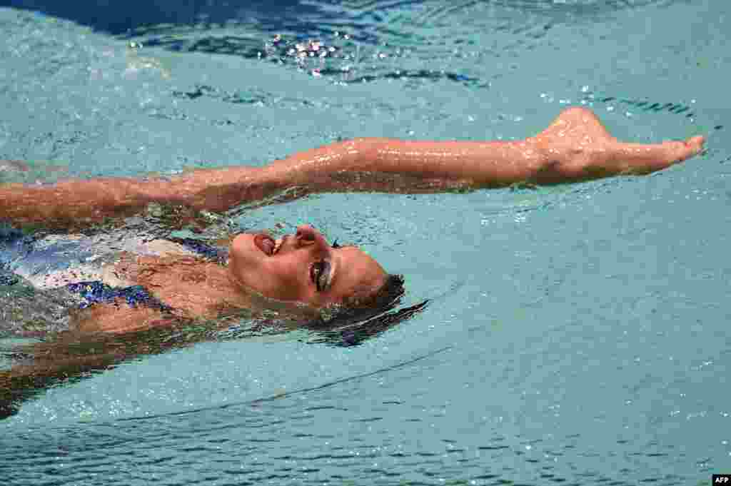 Italy&#39;s Linda Cerruti competes in the synchronized swimming solo technical routine event at the 32nd LEN European Swimming Championships in Berlin, Germany.