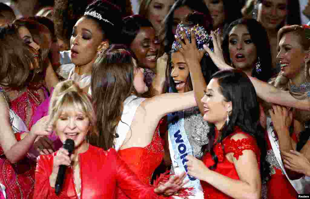 Toni Ann Singh of Jamaica celebrates winning the Miss World 2019 final in London, Dec. 14, 2019.