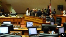 Republican and Democratic leaders in the Hawaii House discussed how to proceed with a vote to remove Rep. Beth Fukumoto from her post as minority leader, Feb. 1, 2017, in Honolulu.