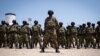 FILE - Mozambican soldiers stand in formation in Pemba, Cabo Delgado province, Mozambique, Sept. 24, 2021.