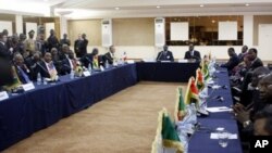 Delegates attend the Economic Community of West African States (ECOWAS) summit dedicated to the recent military coup in Mali, on April 2, 2012, in Dakar.