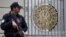 A police officer stands guard in front of the German Consulate, which is closed on indications of a possible imminent attack, in Istanbul, Turkey, March 17, 2016.