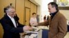 French Ambassador to the U.S. Gerard Araud casts his ballot as he joins French citizens living in the United States voting in the French presidential run-off between Emmanuel Macron and Marine Le Pen, at the French Embassy in Washington, May 6, 2017.