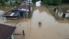 Vista general del barrio Suyapa, parcialmente inundado por el desbordamiento del río Ulúa tras el paso de la tormenta tropical Sara, en Potrerillos, Honduras, el domingo 17 de noviembre de 2024. 