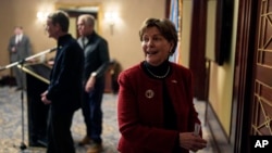 FILE - US Senator Jeanne Shaheen, among a group of American lawmakers visiting Ukraine, finishes a press conference in Kyiv on Feb. 17, 2025. Shaheen announced on March 12, 2025, that she would not seek reelection, putting her state up for grabs in the 2026 midterm election.