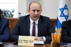 FILE - Israeli Education Minister Naftali Bennett attends the weekly cabinet meeting in Jerusalem, Jan. 27, 2019.