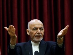 FILE - Afghanistan's President Ashraf Ghani speaks during a news conference in Kabul, Afghanistan, March 1, 2020.