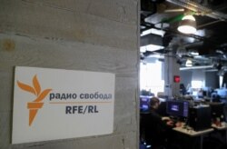 FILE - A view shows the newsroom of Radio Free Europe/Radio Liberty (RFE/RL) broadcaster in Moscow, Russia, Apr. 6, 2021.