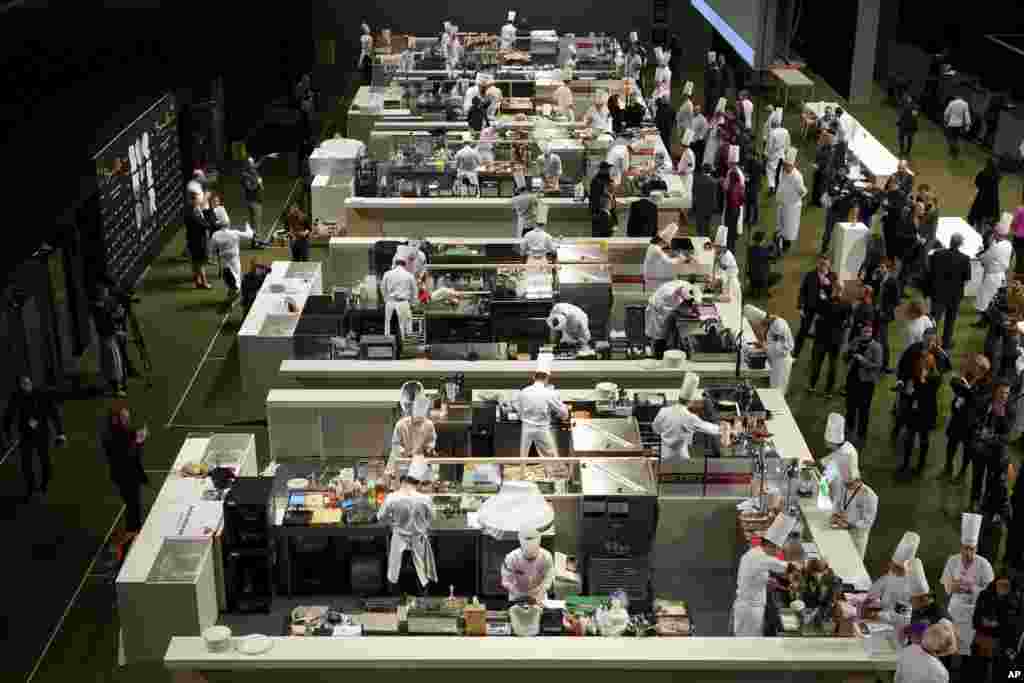 Chefs prepare food during the final of the &quot;Bocuse d&#39;Or&quot; (Golden Bocuse) trophy, in Lyon, central France.