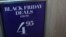 An H&M store advertises "Black Friday Deals" on Saturday, Nov. 23, 2013, in New York. 