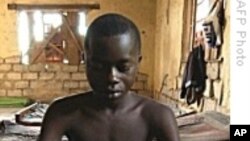 A child soldier in the DRC. The U.S. Treasury Department has blacklisted Baudoin Ngaruye and Colonel Innocent Kaina for recruiting child soldiers, a practice banned by international law. 