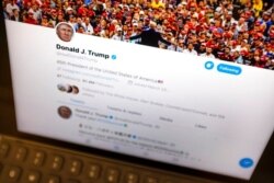 FILE - President Donald Trump's Twitter feed is photographed on an Apple iPad in New York, June 27, 2019.