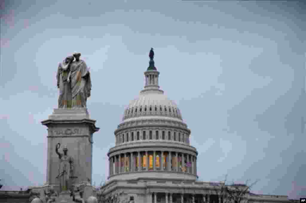 Nov. 13, 2012, photo shows the Capital building in Washington. The federal government started the 2013 budget year with a $120 billion deficit, an indication that the U.S. is on a path to its fifth straight $1 trillion-plus deficit. Another soaring deficit puts added pressure on President Barack Obama and Congress to seek a budget deal in the coming weeks. (AP Photo/J. Scott Applewhite)