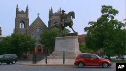 Leaders of the Confederacy are memorialized in monuments dominating one of Richmond, Virginia's main boulevards.