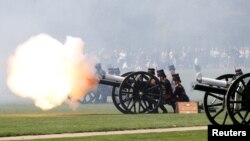 Members of The King’s Troop Royal Artillery fires a round during the 41 Gun Royal Salute marking the 96th birthday of Britain’s Queen Elizabeth, in Hyde Park, London, April 21, 2022.