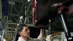 BIll Beaverson works on a Jeep at the Chrysler Toledo Assembly complex, in Toledo, Ohio. The U.S. unemployment rate fell last month to its lowest level in more than two years.