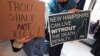 Protesters gather outside the Senate Chamber prior to a vote on the death penalty at the State House in Concord, New Hampshire, May 30, 2019.