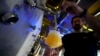 Head Brewmaster Tobias Zollo fills beer at the Weihenstephan brewery in Freising, Germany, Sept. 20, 2024.