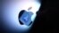 FILE - This illustration photo shows the Apple App Store logo reflected from an iPhone onto the back of an iMac in Los Angeles, Aug. 26, 2021.