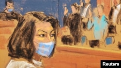 FILE - Ghislaine Maxwell sits as the jurors are sworn in at the start of her trial on charges of sex trafficking, in a courtroom sketch in New York City, Nov. 29, 2021. 