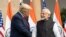 U.S. President Donald Trump, first lady Melania Trump and Indian Prime Minister Narendra Modi stand for photographs at Hyderabad House in New Delhi, India, Tuesday, Feb. 25, 2020.