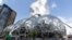 FILE - In this April 27, 2017 file photo, construction continues on three large, glass-covered domes as part of an expansion of the Amazon.com campus in downtown Seattle. 