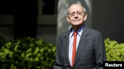 FILE - Associate Supreme Court Justice Stephen Breyer arrives for the swearing in ceremony of Judge Neil Gorsuch as an associate Supreme Court justice in the Rose Garden of the White House in Washington, April 10, 2017.