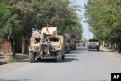 Fuerzas de seguridad afganas llegan a un punto de lucha contra el Talibán en la provincia de Kunduz, al norte de Kabul, el sábado 31 de agosto de 2019.