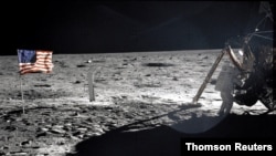 NASA file image shows Neil Armstrong on the moon next to the Lunar Module Eagle
