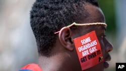 FILE - A man is seen during the third Annual LGBTQ Pride celebrations in Entebbe, Uganda on Aug. 9, 2014. Ugandan authorities have charged a man with aggravated homosexuality it was announced Tuesday, Aug, 29, 2023, which carries a possible death sentence.