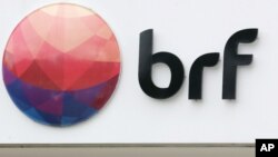 FILE PHOTO: A meatpacking company BRF SA's logo is pictured in Sao Paulo, Brazil March 17, 2017. 