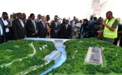 Tanzanian President John Magufuli and Egyptian Minister of Electricity and Renewable Energy Mohamed Hamed Shaker attend the launch of the construction of the Rufiji Hydro Power project near Dar es Salaam, Tanzania, July 26, 2019.