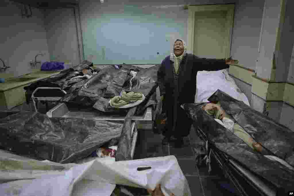 Hilala Meryeh, a 64-year-old Palestinian mother of four, weeps in the middle of the dingy identification room after finding her son&#39;s body at the Al-Mojtahed Hospital morgue in Damascus, Syria.