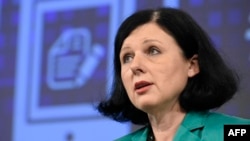 EU Commissioner of Justice, Consumers and Gender Equality Vera Jourova speaks during a press conference at EU headquarters in Brussels, Belgium, Dec. 9, 2015. 