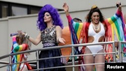 Revelers take part in the Gay Pride parade along Paulista Avenue in Sao Paulo, Brazil, June 18, 2017.