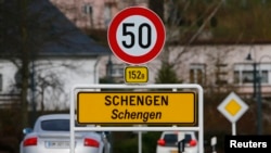 A street sign marks the beginning of Schengen zone, Luxembourg, Jan. 27, 2016. The European Parliament granted Georgia's long-sought privilege to travel to the Schengen zone without obtaining visas.