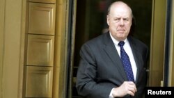 FILE - Lawyer John Dowd exits Manhattan Federal Court in New York, May 11, 2011.