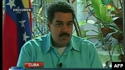 法新社电视显示委内瑞拉副总统兼外长马杜罗2013年1月1日在哈瓦那接受一次访问的图像