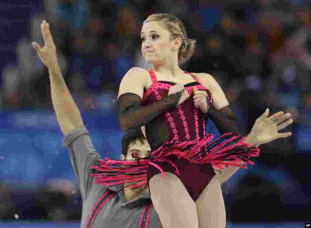 Paige Lawrence e Rudi Swiegers do Canadá. Jogos Olímpicos de Inverno, Sochi, Fev. 11, 2014, Rússia