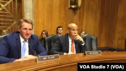 Senator Jeff Flake naVaCory Booker 