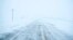 Snow blows and drifts over County Road K22 near Merrill, Iowa, on Jan. 12, 2024.
