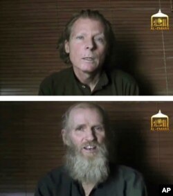 FILE - A photo combination if images taken from video released June 21, 2017, by Taliban spokesman Zabihullah Mujahid, shows kidnapped Australian Timothy Weeks, top, and American Kevin King.