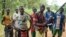 FILE -  fighters from a Christian militia movement known as the "anti-balaka" display their makeshift weaponry in the village of Boubou, between the towns of Bossangoa and Bouca, Central African Republic.
